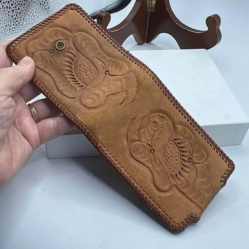 Vintage Handtooled leather Men’s wallet .